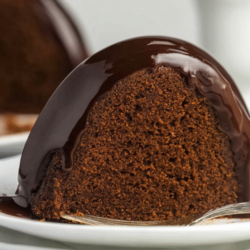 mohamedb 47441 simple chocolate pound cake taken with an old ca 172ebb22 536c 47dd b8f4 873b1fa6df61 - Decadent Chocolate Pound Cake Recipe